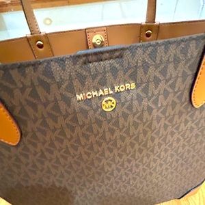Michael Kors handbag with attached smaller bag inside.  Excellent condition